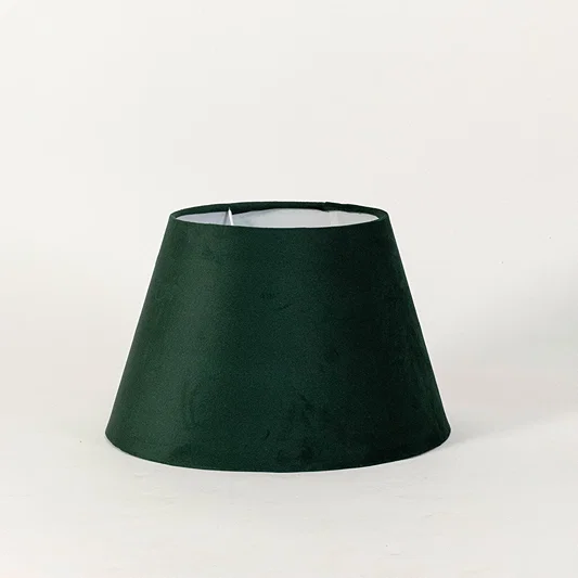 Modern fabric lampshade in green finish for table or floor lamp soft lighting and home decor placement white background.