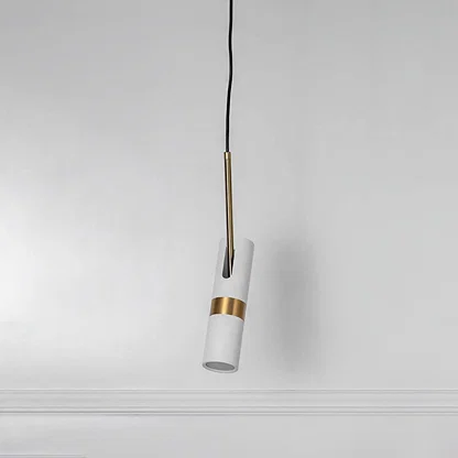 White pendant light with gold accent and hanging cord placed against neutral wall background showcasing minimal stylish lighting decor appeal.