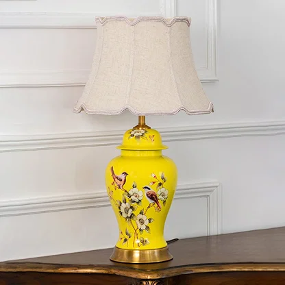 Astra crystal table lamp with white pleated shade and gold base shown on plain white background with light turned off for styling.