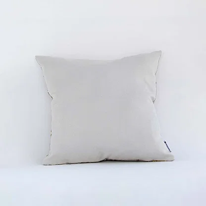 Back side view of beige cushion cover showing clean seams smooth fabric finish and concealed closure for neat styling.