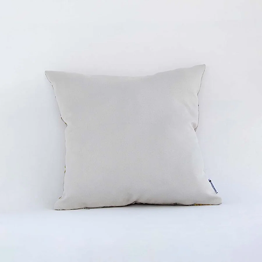 Back side view of beige cushion cover showing clean seams smooth fabric finish and concealed closure for neat styling.