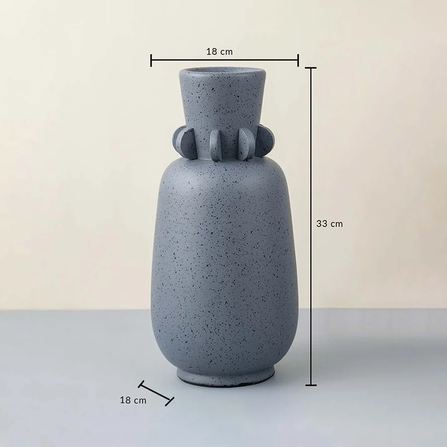 Grey ceramic vase with speckled design 33 cm height and 18 cm width ideal for table decor and home styling.
