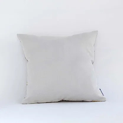 Soft white square cushion cover displayed on white background ideal for sofa bed or chair styling in modern home decor.