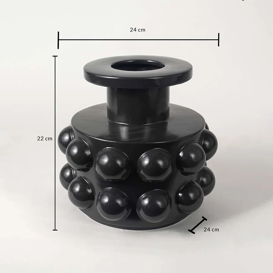 Black ceramic vase measuring 22 cm in height and 24 cm in width featuring a glossy spherical textured surface.