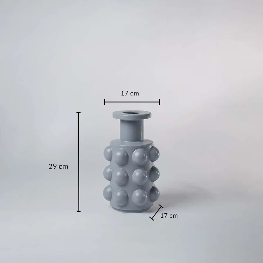 A grey textured vase shown with size details measuring 29 cm height and 17 cm width offering a clear understanding of its full dimensions.