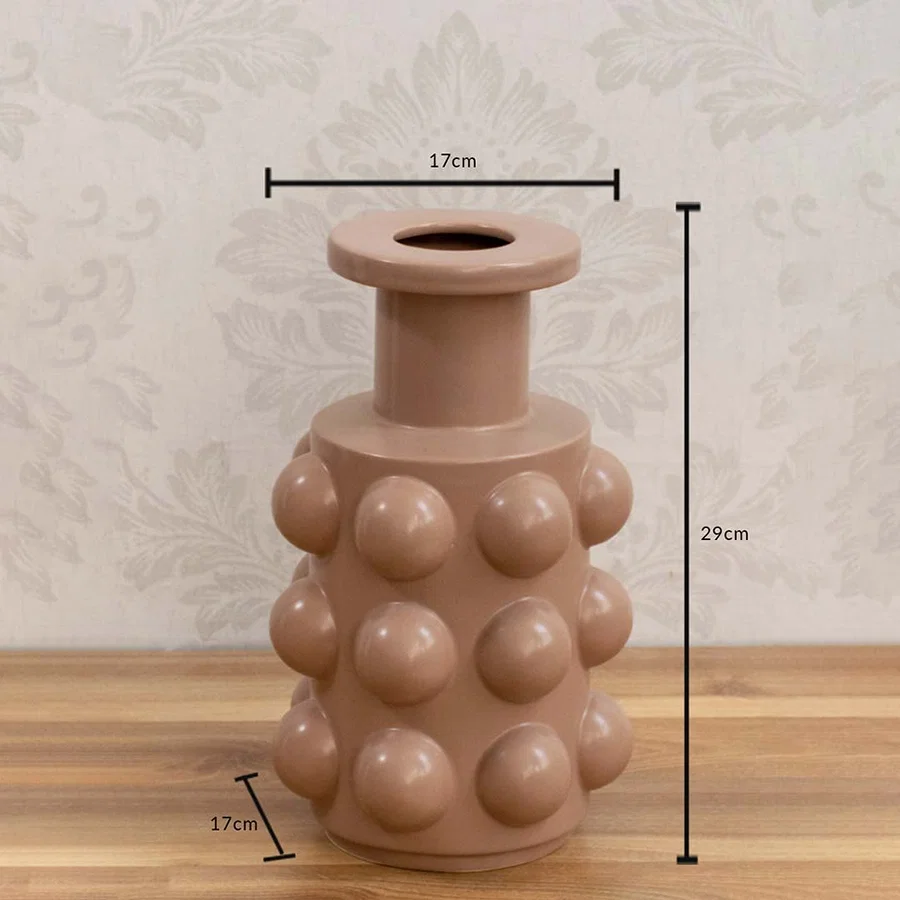 A beige sculptural vase with raised rounded details shown with size measurements of 29 cm height and 17 cm width to provide clear dimensions.