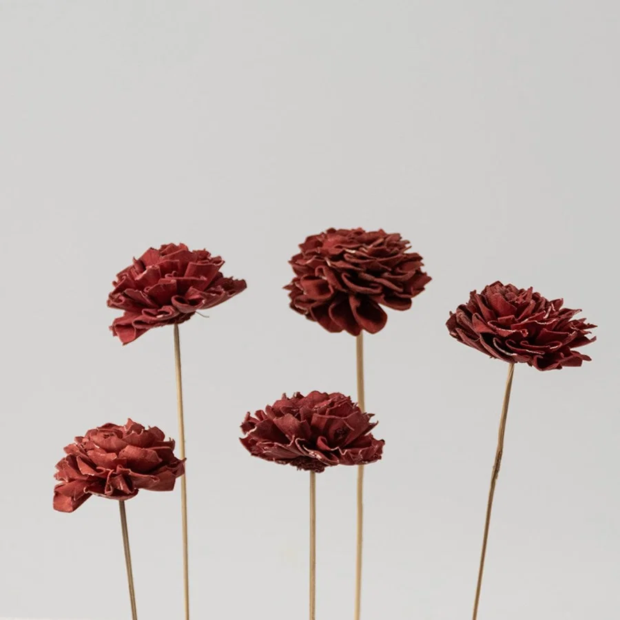 Bundle of red sola flower sticks is an artificial flower set for modern home decor wedding decoration and craft projects.