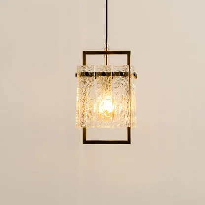Gold metal wall light with crystal glass accents illuminated to showcase premium decorative wall lighting elegance.