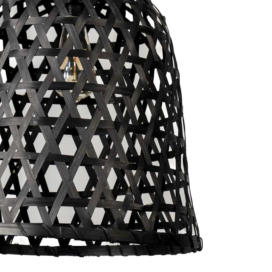 Detailed view of black perforated metal pendant light highlighting textured pattern and artisan design.