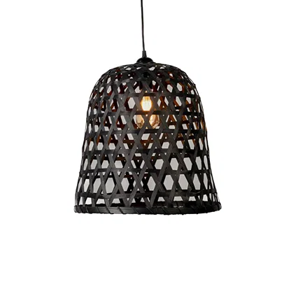 Black metal pendant light with dome shaped perforated cage pattern and warm glow bulb suspended on clean neutral wall background for modern decor styling.