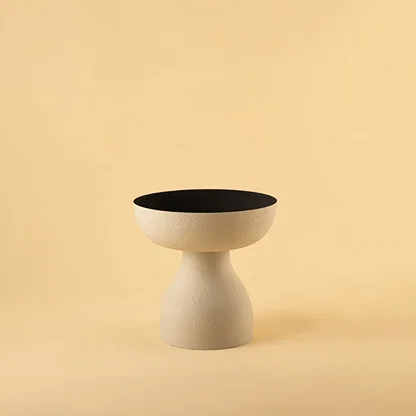 Grey modern pedestal vase bowl displayed on a clean white background highlighting its textured finish and bold form.