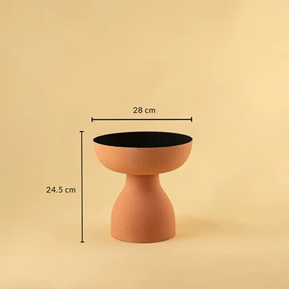 Terracotta orange pedestal bowl with black interior shown with 28 cm width and 24.5 cm height for modern artistic home decor.