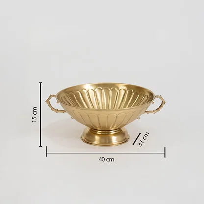 Gold fruit bowl with handles shown with 43 cm width 13.5 cm height and 22 cm depth placed on white background.