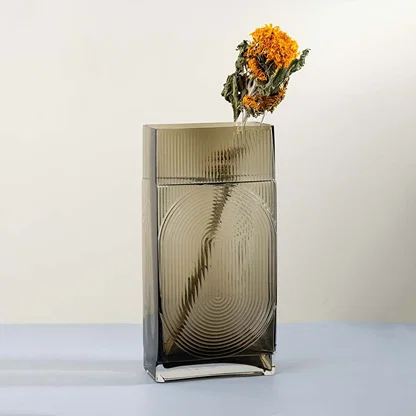 Rectangular ribbed glass vase in smoke brown finish modern geometric design decorative accent light on white background for home decor.