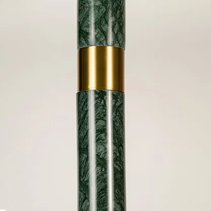 Green marble and gold metal pendant light closeup showcasing premium stone detailing and luxury craftsmanship.