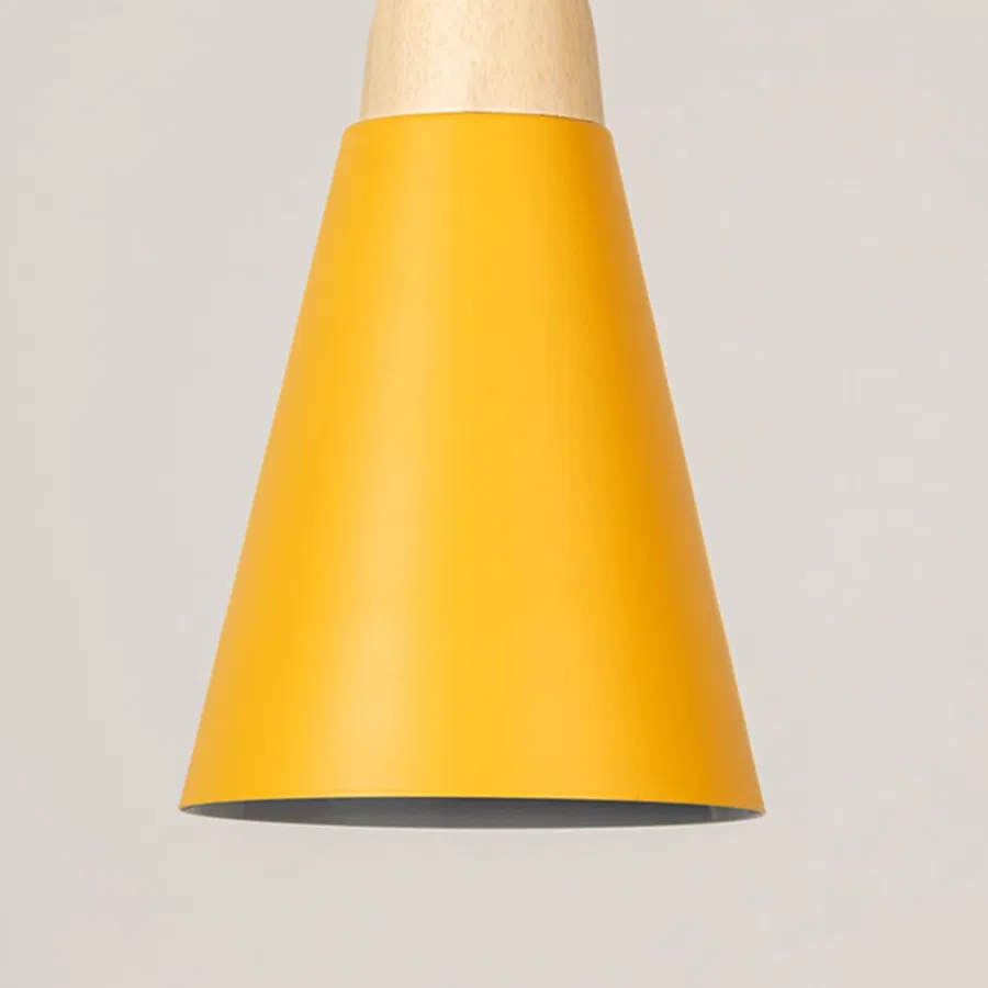 Yellow metal pendant light with natural wood detailing showcasing sleek cone shape and modern Scandinavian style.