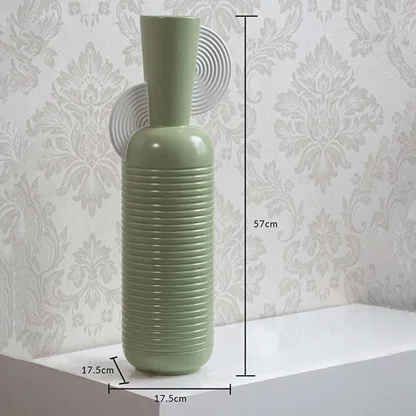 Mint green ribbed vase with spiral accent shown with 57 cm height and 17.5 cm width offering a clear accurate size reference.
