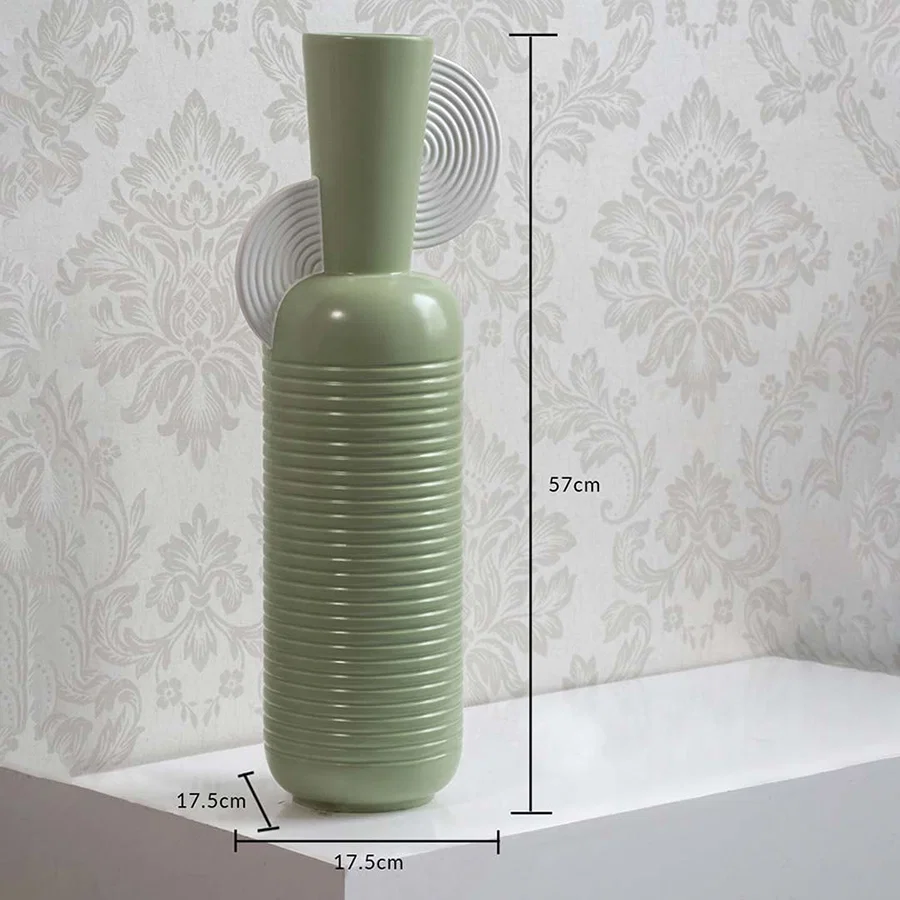 Mint green ribbed vase with spiral accent shown with 57 cm height and 17.5 cm width offering a clear accurate size reference.
