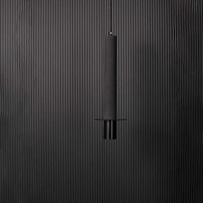 Closeup of slim black cylindrical pendant ceiling light showing fine details and modern minimalist hanging design style.