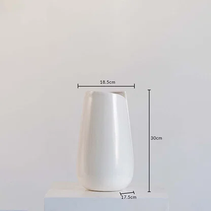 White ceramic vase shown with dimensions 30 cm height  18.5 cm width  and 17.5 cm depth  set against a clean white backdrop for clarity.