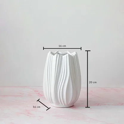 White textured vase with 20 cm height and 16 cm width displayed with measurements on a pink base.