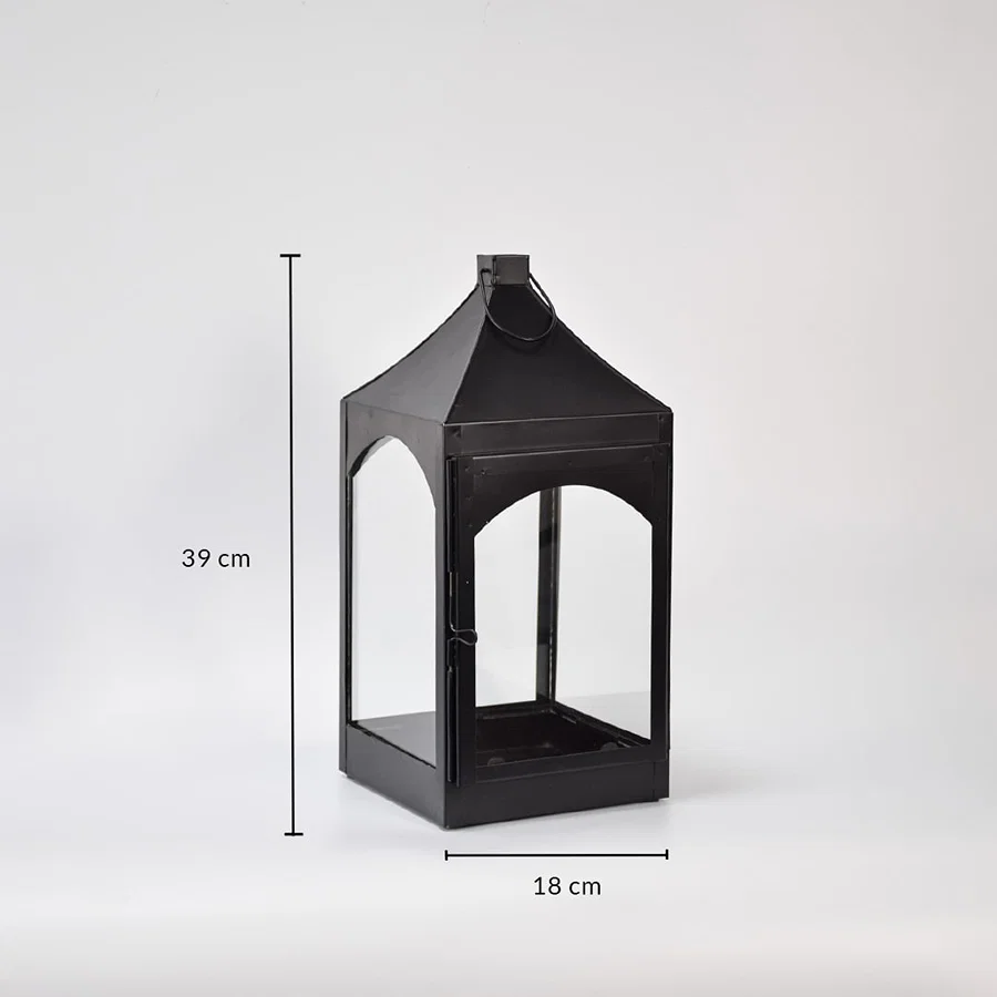 Tall black metal lantern with pointed top showing 50 cm height and 20 cm width dimensions designed for statement floor decor styling.