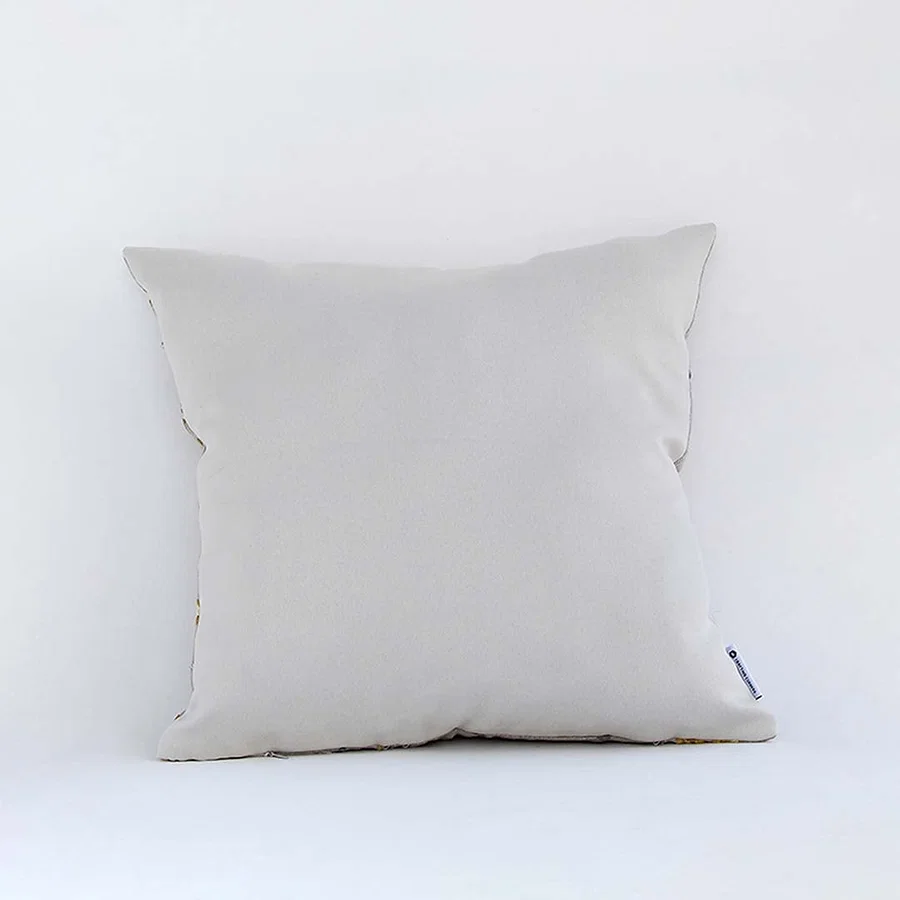 Plain beige cotton cushion cover displayed clearly offering a versatile neutral décor piece made from soft comfortable and skin friendly cotton material.