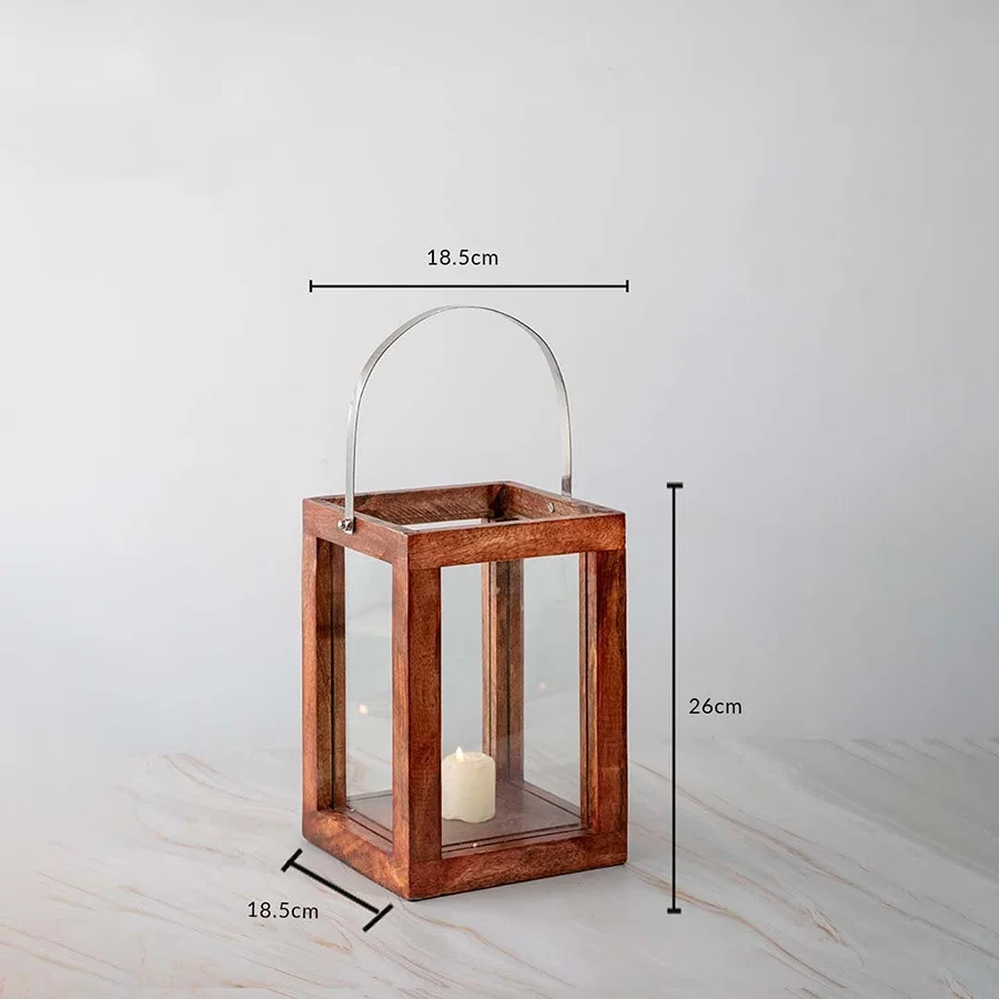 Wooden lantern dimensions 26 cm height and 18.5 cm width displayed clearly for reference on white backdrop.
