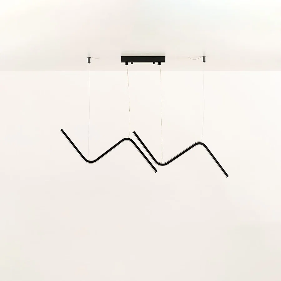 Black wave LED chandelier with sculptural flowing design ideal for large living rooms and modern interiors offering a bold artistic ceiling light statement.