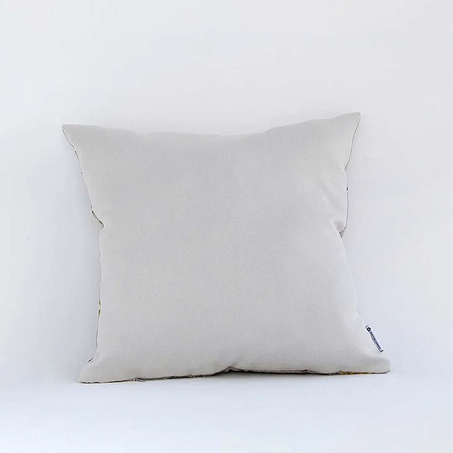 Back side view of white cushion cover showing clean seams soft fabric finish and concealed closure for neat styling.