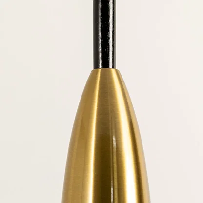 Closeup of brushed gold metal wall light stem for elegant modern bedroom hallway and living room decor.