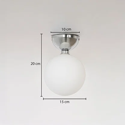 Ceiling light with chrome base and frosted glass globe shown with size dimensions 20 cm height 15 cm width and 10 cm base.