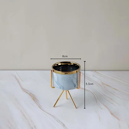 A compact marble finish planter on a gold metal stand featured with clear measurements showing 8 cm width and 5.5 cm height for reference.