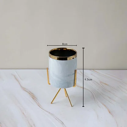 A marble finish planter on a gold stand displayed with clear size markings showing 8 cm width and 9.5 cm height for an accurate view.