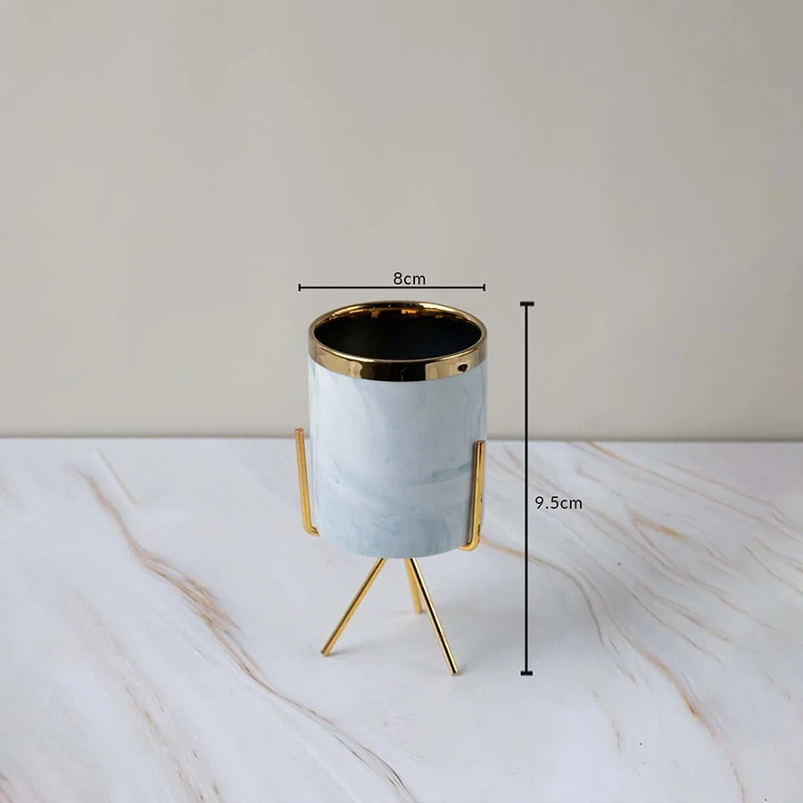 A marble finish planter on a gold stand displayed with clear size markings showing 8 cm width and 9.5 cm height for an accurate view.