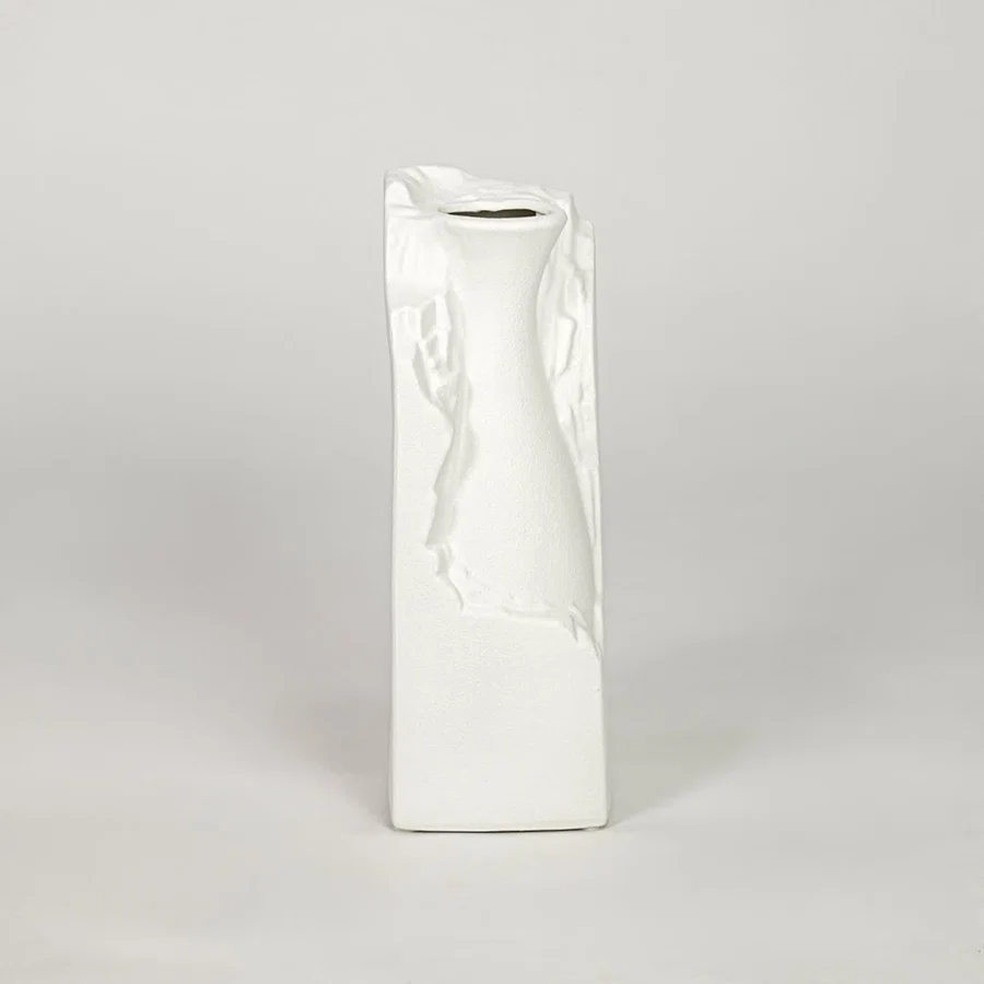 White ceramic flower vase with textured finish modern decorative vase for tabletop shelf console decor styling.