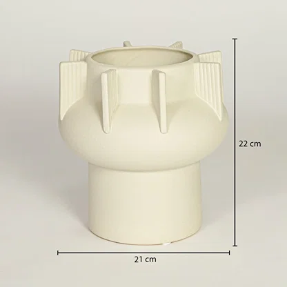 Beige ceramic decorative vase with sculptural ridges showing 22 cm height and 21 cm width suitable for table shelf or console placement.