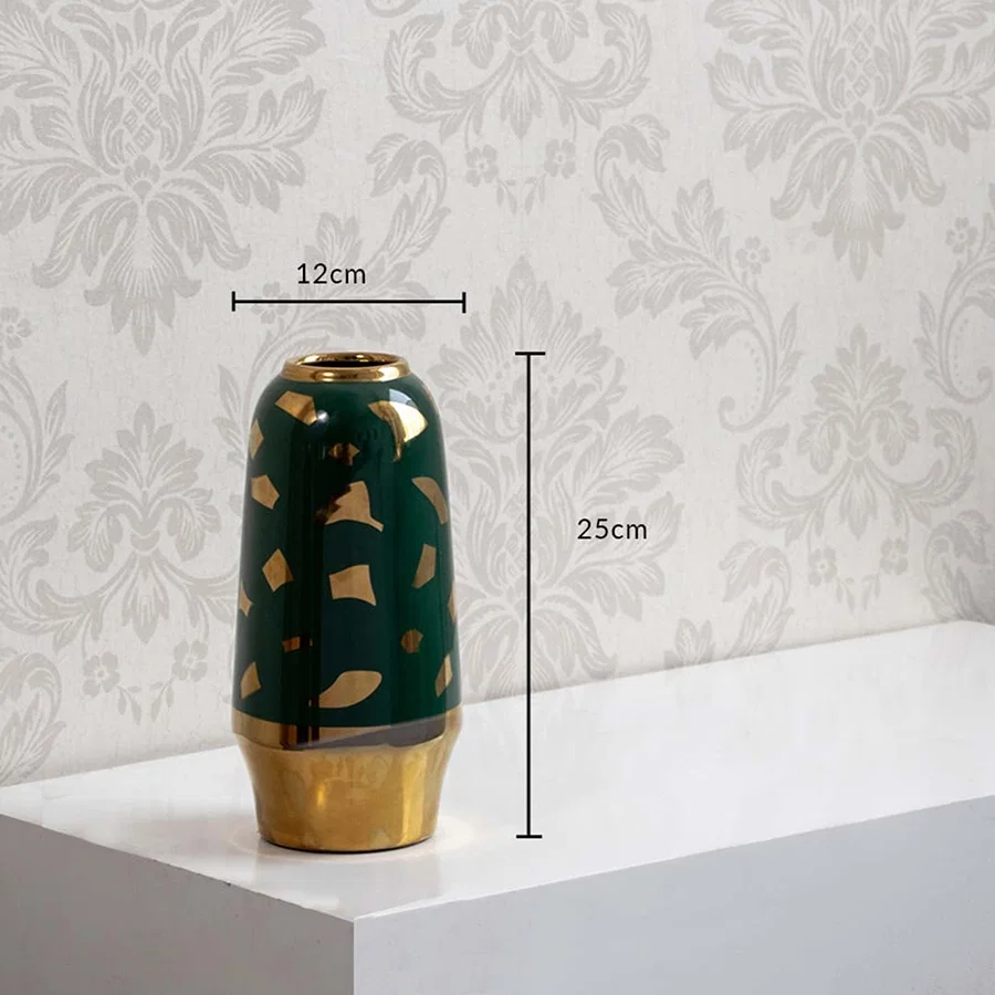 Green ceramic decorative jar with gold base showing 23 cm height and 12 cm width dimensions ideal for console or shelf decor use.