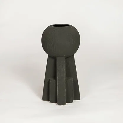 Modern black ceramic sculptural decorative vase ideal for dried flower arrangement on console table shelf and stylish home decor.