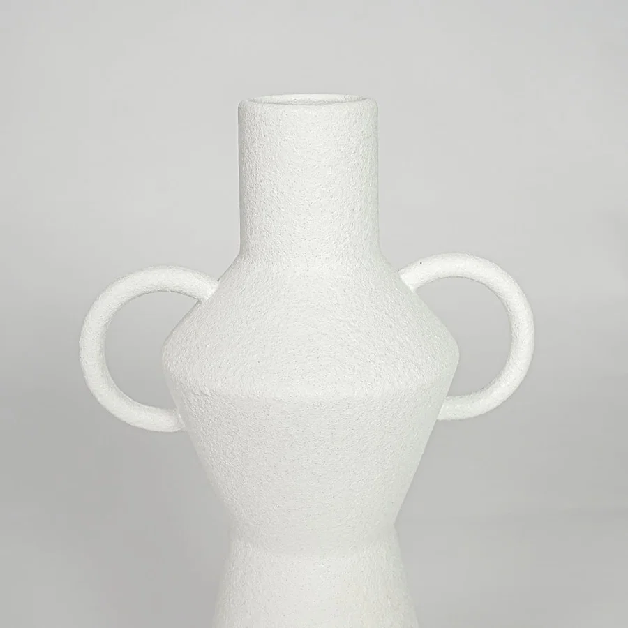 Closeup white ceramic textured decorative vase detail modern tall flower vase for table shelf console decor.