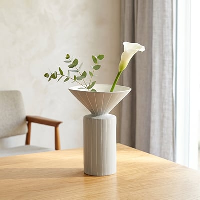 White ceramic flower vase placed on wooden table modern decorative vase for living room console home decor styling.