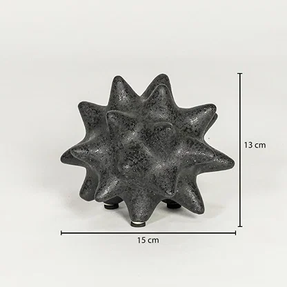 Black textured ceramic decorative object showing 13 cm height and 15 cm width suitable for table shelf or console placement.