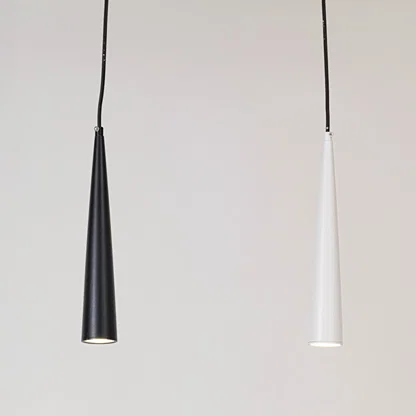 Black and white metal cone pendant lights showcasing sleek minimalist designs for modern home decor spaces.