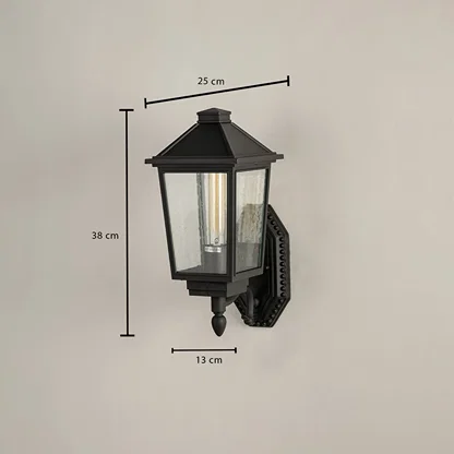 Black metal outdoor lantern with textured clear glass shown with 38 cm height 25 cm width and 13 cm depth for accurate outdoor installation sizing.