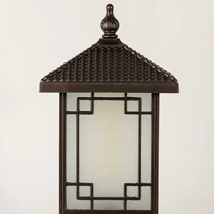 Black outdoor lantern Closeup seeded glass Light On showing the warm ambient glow and decorative pebbled glass panels detail.