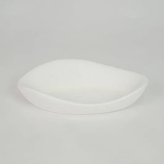 White ceramic decorative tray for modern coffee table placement and elegant indoor home decor styling accent piece.