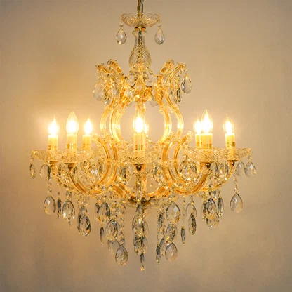 White background image of large candelabra chandelier for modern living room decor styling with a bright warm glow.