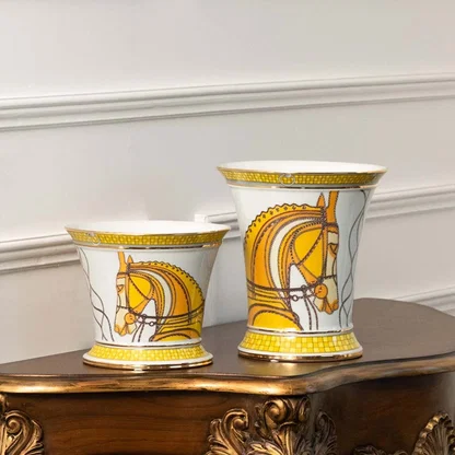 White ceramic jar with gold horse artwork perfect for upscale décor styling and modern tabletop placement.