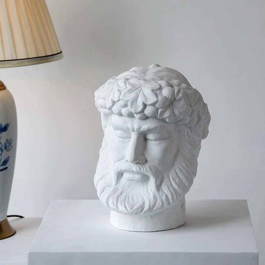 White ceramic decorative face sculpture with classical portrait design for elegant tabletop styling and modern home decor.