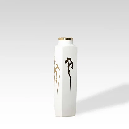 Tall white ceramic jar with gold horse artwork perfect for luxury décor styling and contemporary living room accents.
